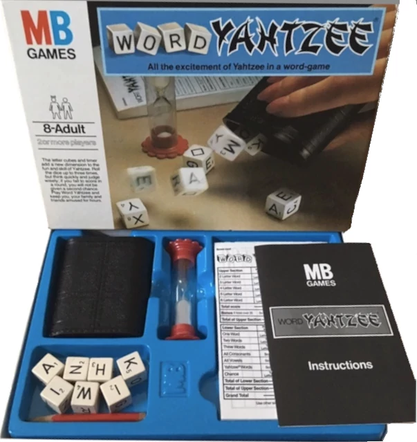 An open Word Yahtzee box from 1979, displaying the letter dice, timer, shaker, score cards, and instructions booklet.