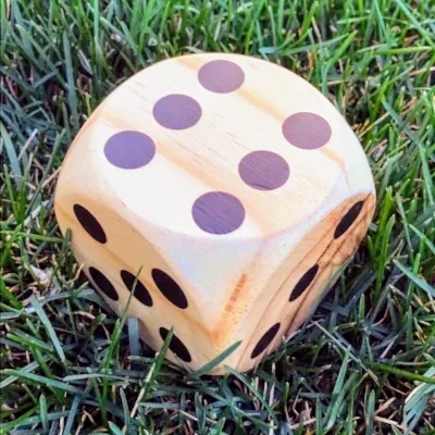 An over-sized outdoor Yahtzee die