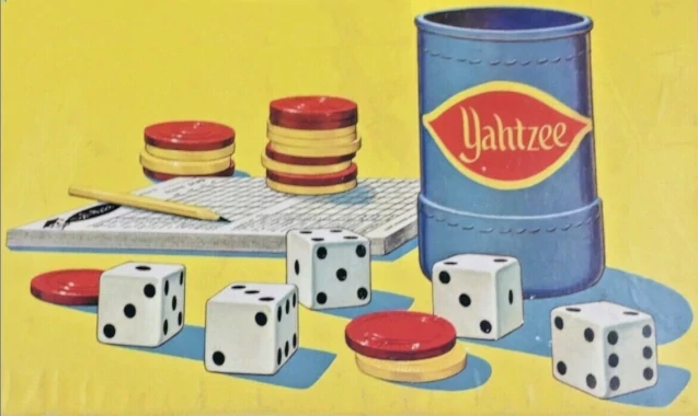 An image of Yahtzee game equipment from a 1973 Yahtzee box.